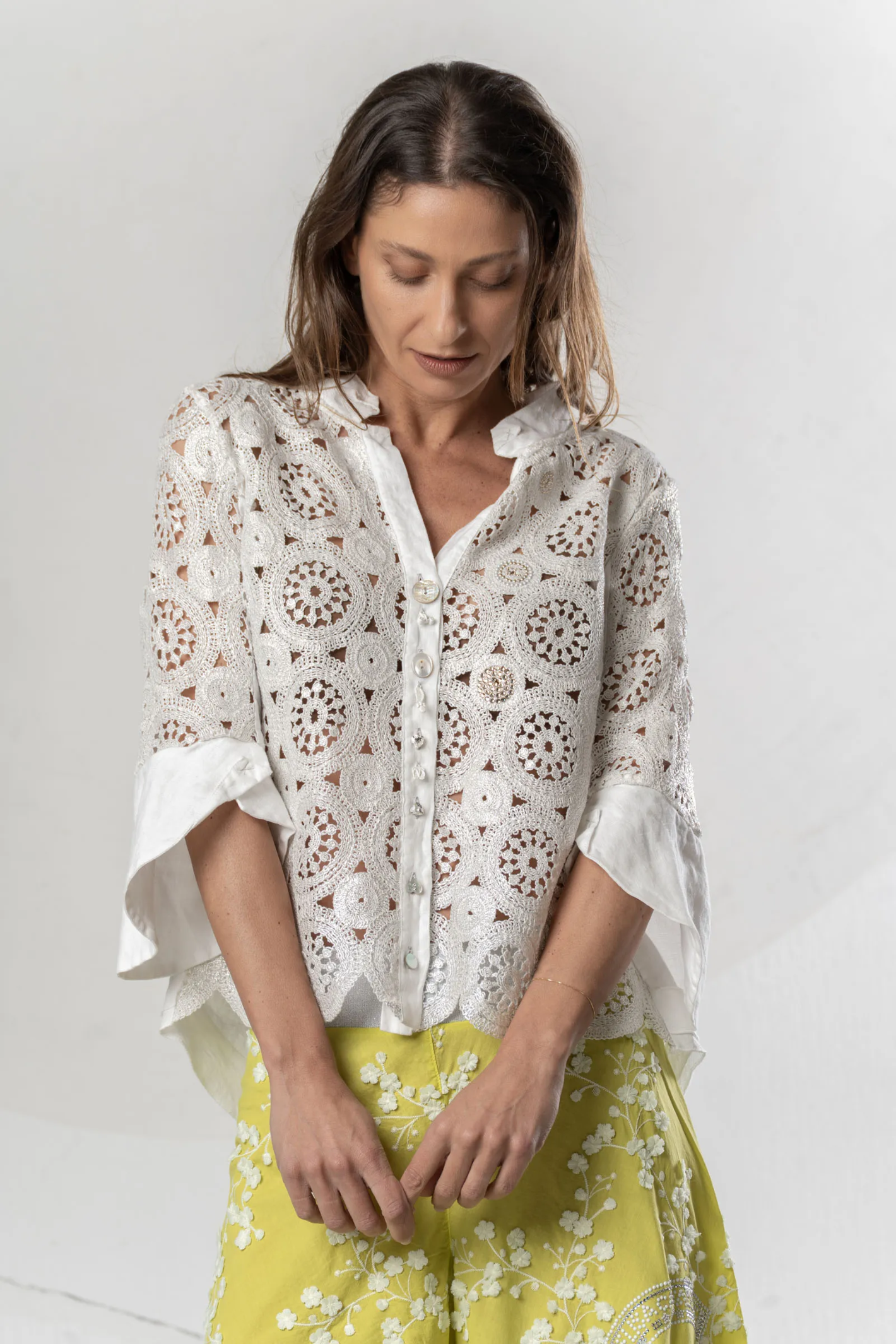 Model wearing Elisa Cavaletti White Lace Blouse Silver Detail Cotton Linen Embellished Shirt ELP261018104 03149 by Elisa Cavaletti shop Dotique