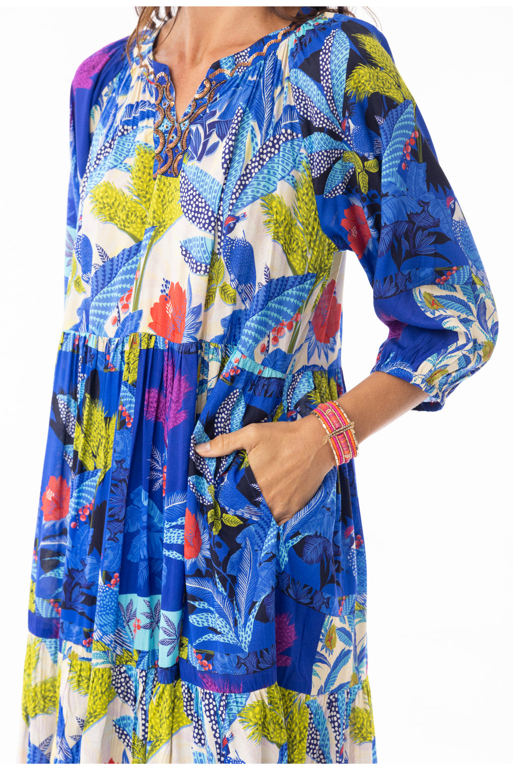 Close-up of model wearing Escape 30120 Luna Dress V Print by Escape with hand in pocket, shop Escape at Dotique