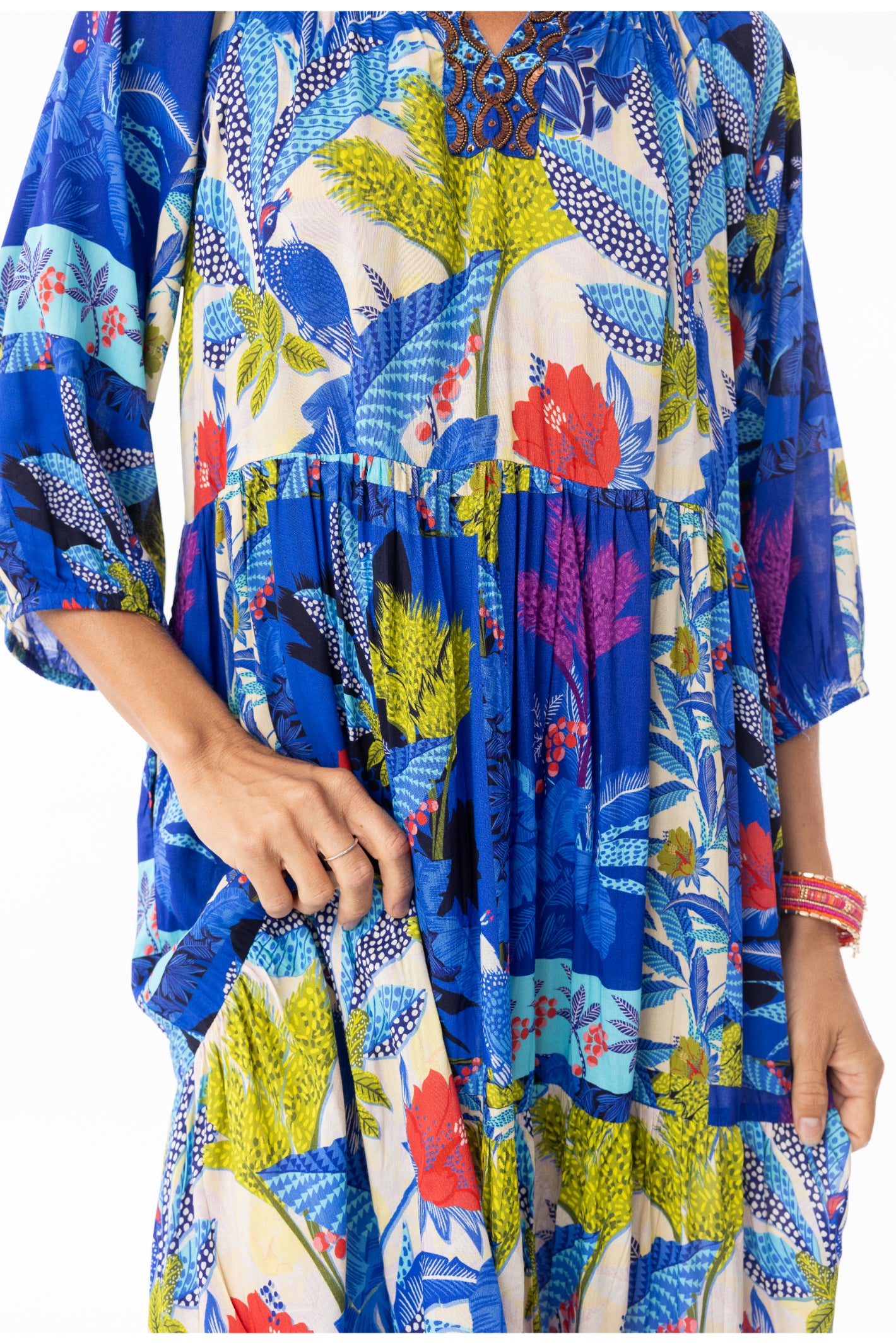 Close-up of vibrant floral pattern on Escape 30120 Luna Dress V Print by Escape Shop Escape at Dotique