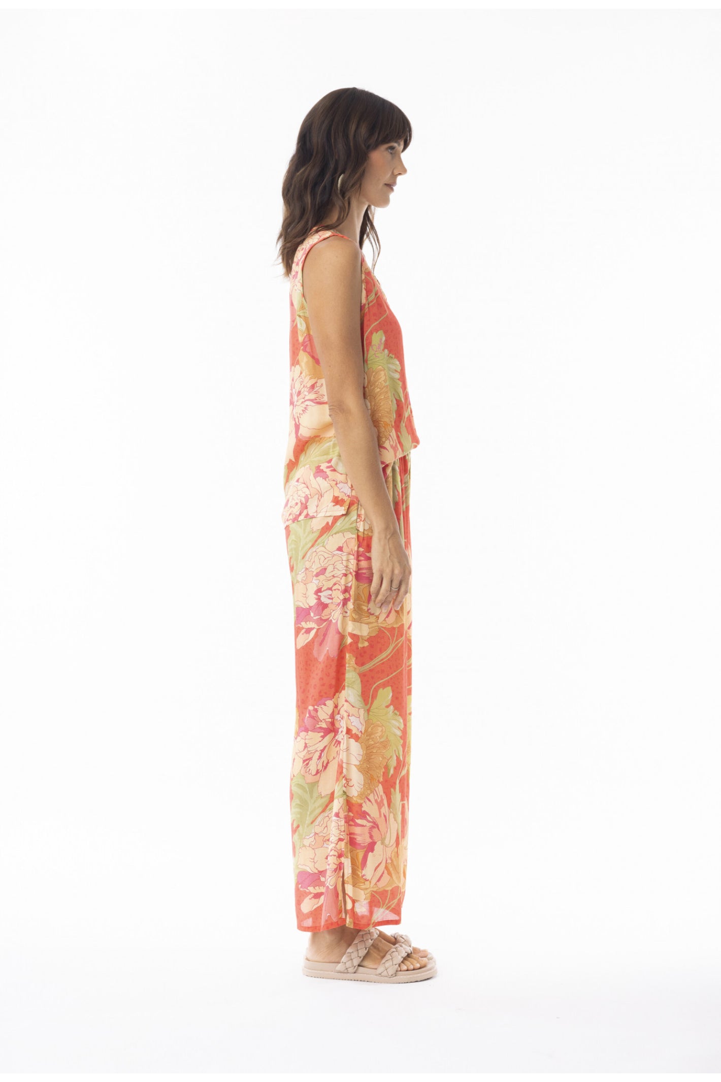 Side view of model wearing Escape 9635 Rosa Print Wide Leg Trousers by Escape, shop Escape at Dotique for vibrant relaxed style