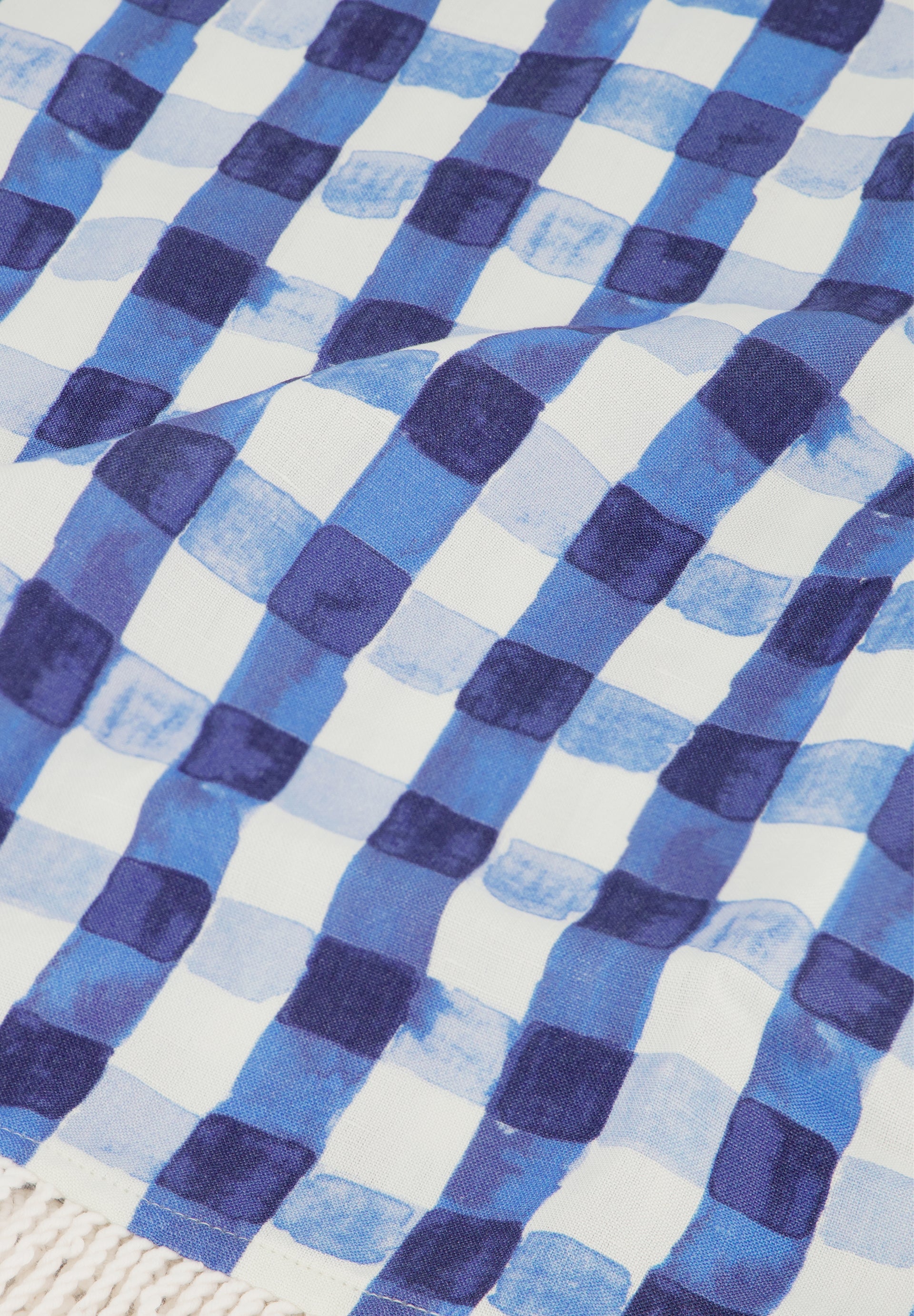 Close-up of a blue and white check pattern fabric from Fabienne Chapot Maxime Top Navy/Cosy White, shop Fabienne Chapot at Dotique.