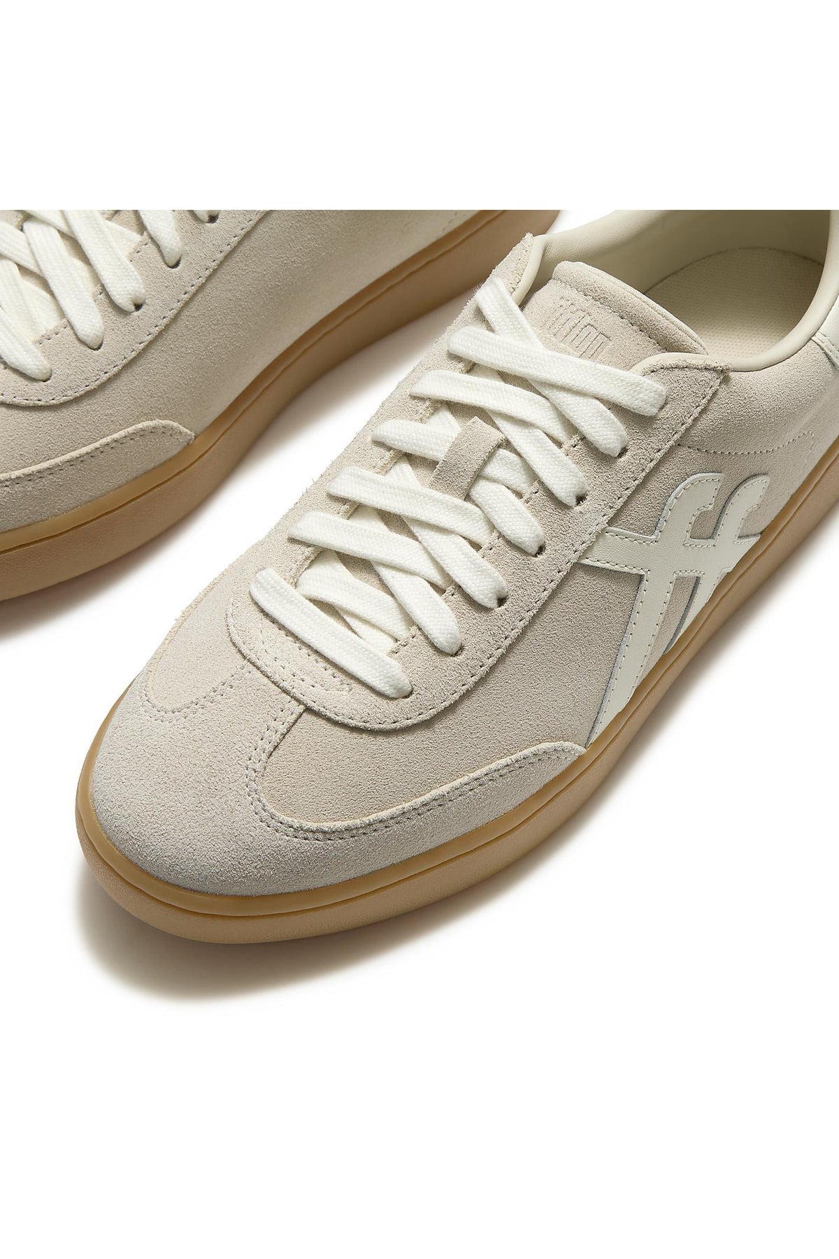 Fitflop The Dash T-Toe Suede Trainers Hazy Taupe/Cream – close-up detail. Shop FitFlop at Dotique.