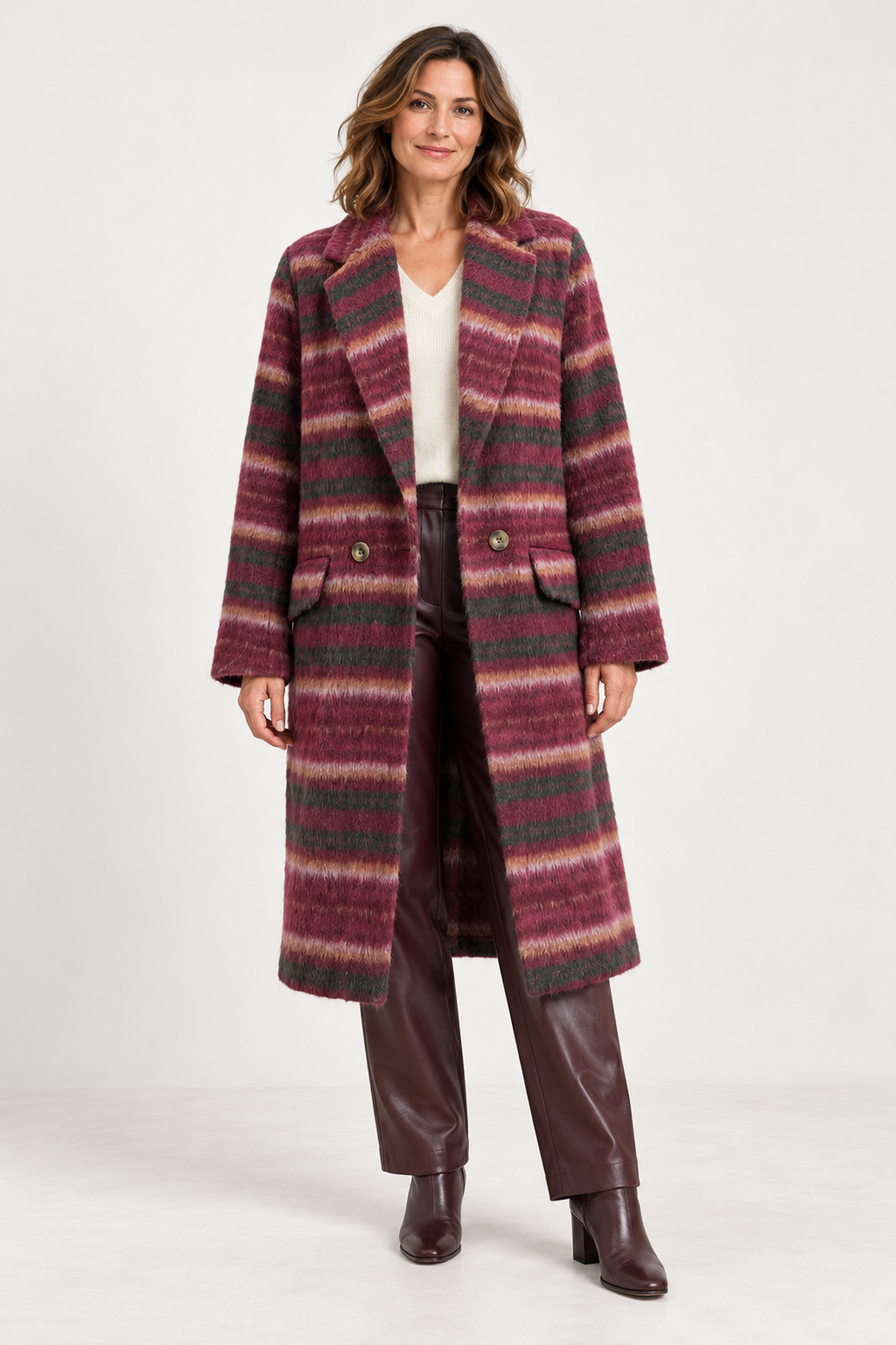 Foil FO8561 Cover Story Coat in Dark Cherry Check, front model view with burgundy faux-leather trousers and a cream V-neck jumper. Shop Foil at Dotique.
