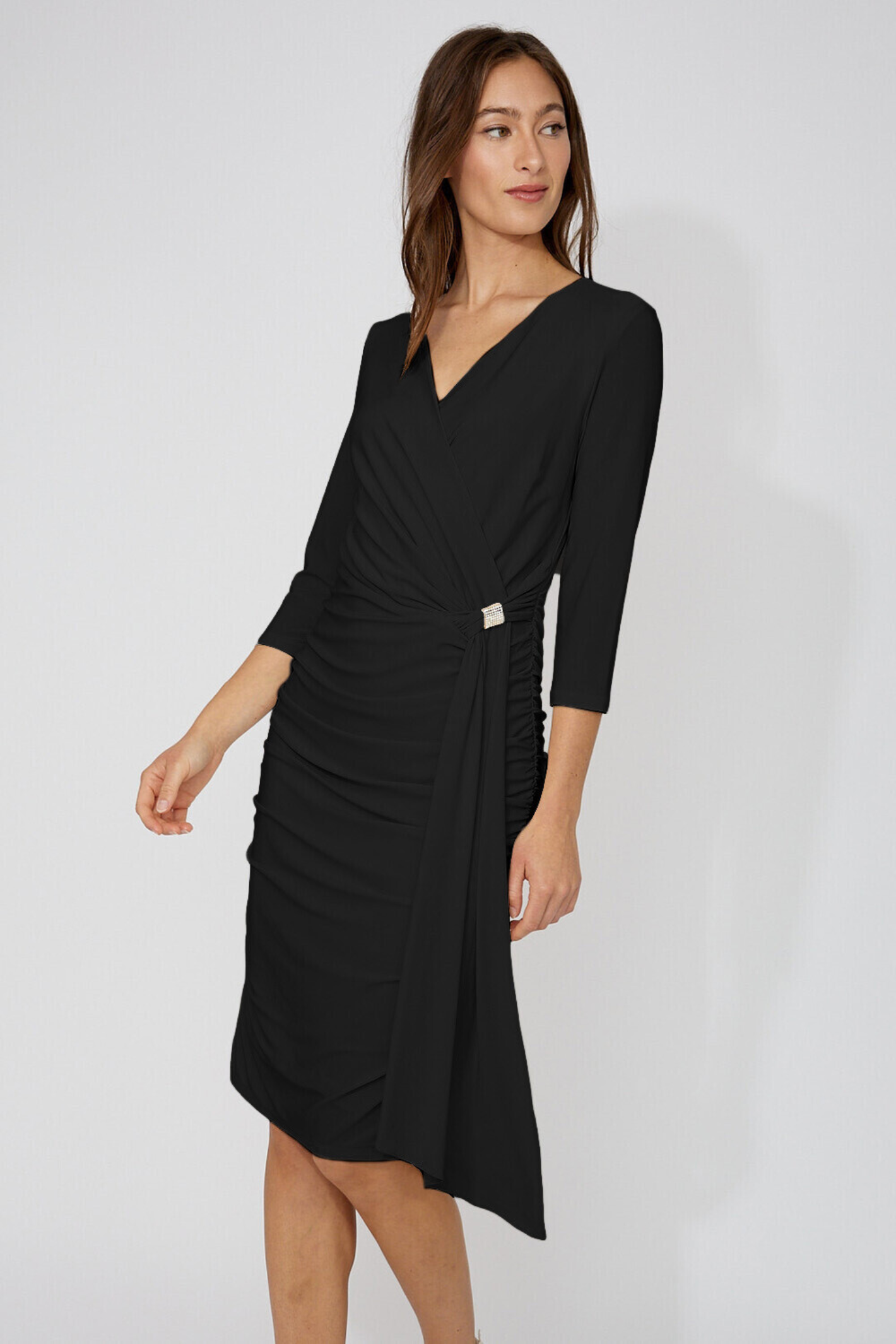 Woman wearing Frank Lyman 268011 Black Knee-Length Wrap Dress by Frank Lyman, shop the vendor at Dotique online store