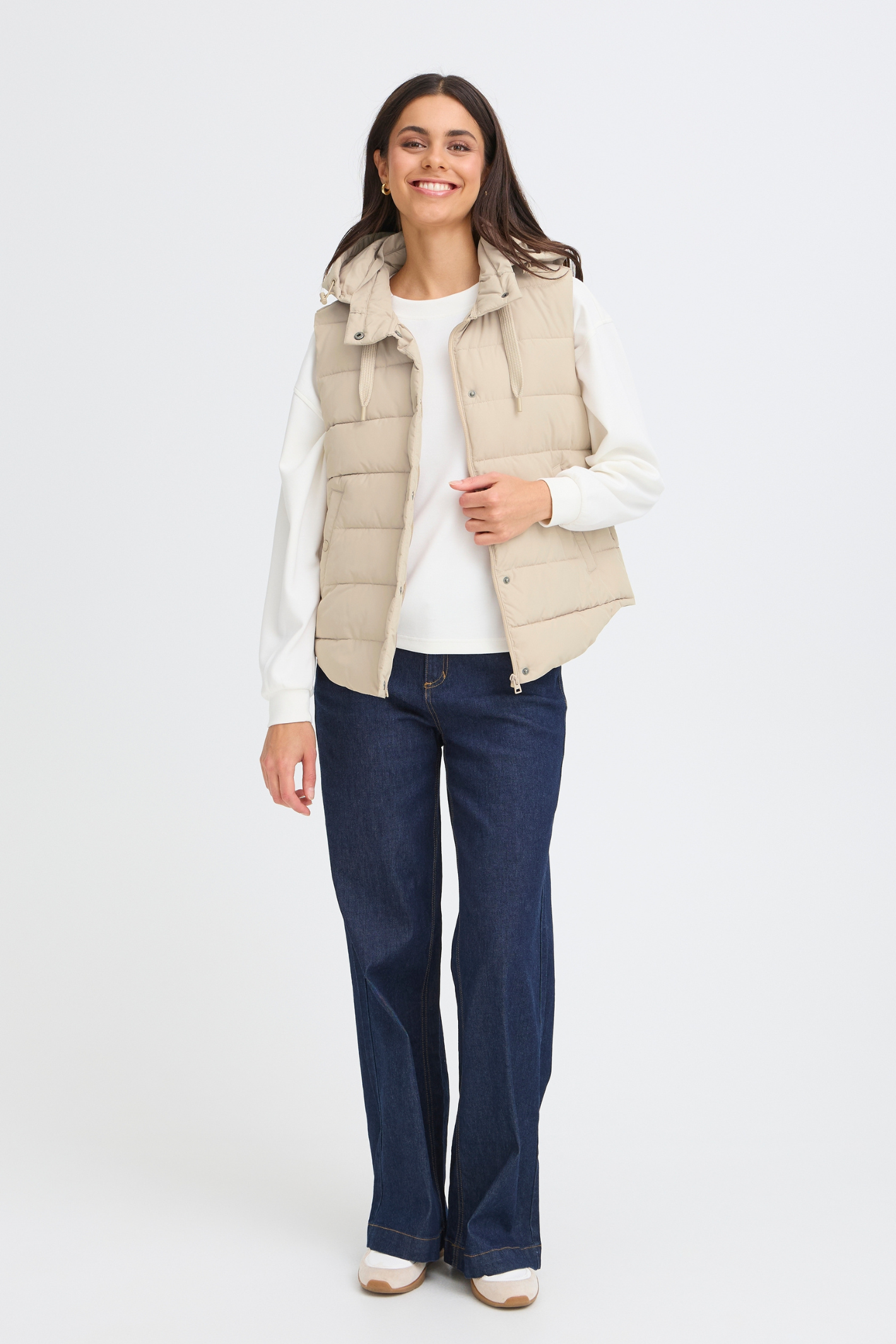 Lightweight padded gilet in Oxford Tan by Fransa. An easy everyday layer for spring and autumn. Shop online or in store at Dotique.