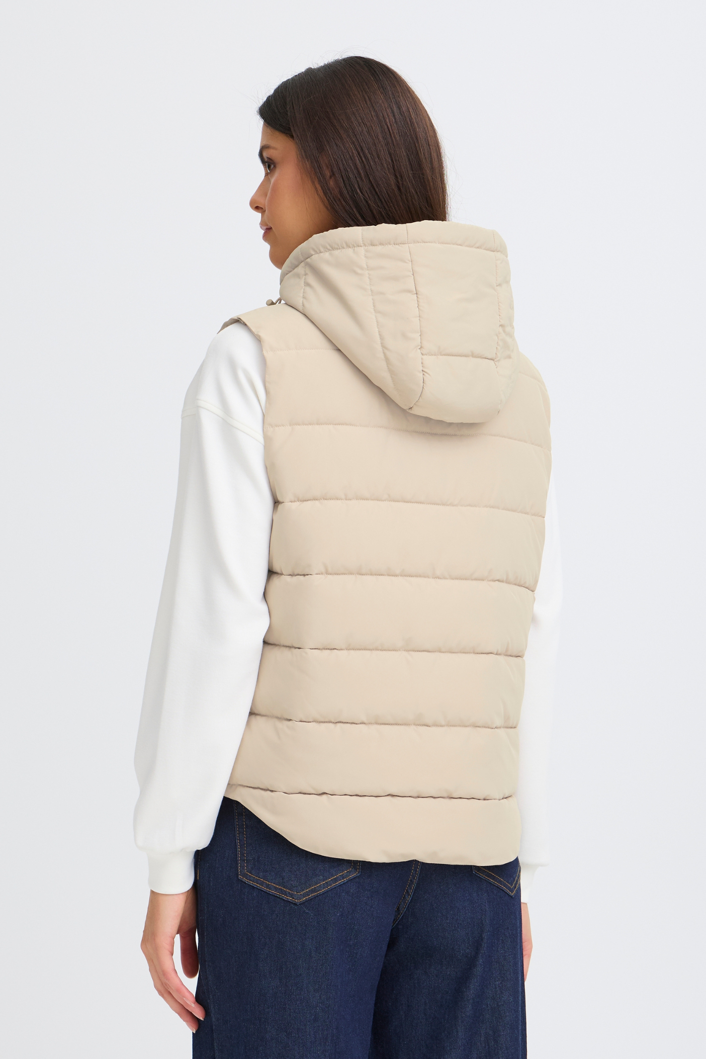 Lightweight padded gilet in Oxford Tan by Fransa. An easy everyday layer for spring and autumn. Shop online or in store at Dotique.