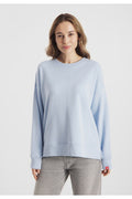 Model wearing Frieda & Freddies 261222 Light Blue Sweatshirt by frieda & freddies shop frieda & freddies at Dotique front view