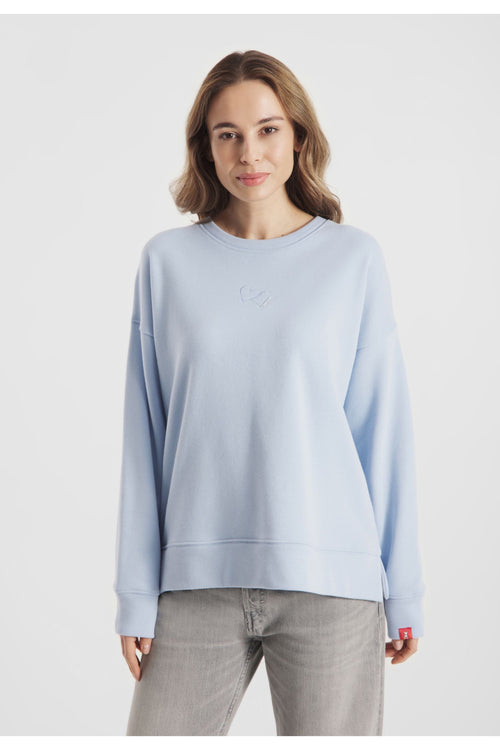 Model wearing Frieda & Freddies 261222 Light Blue Sweatshirt by frieda & freddies shop frieda & freddies at Dotique front view