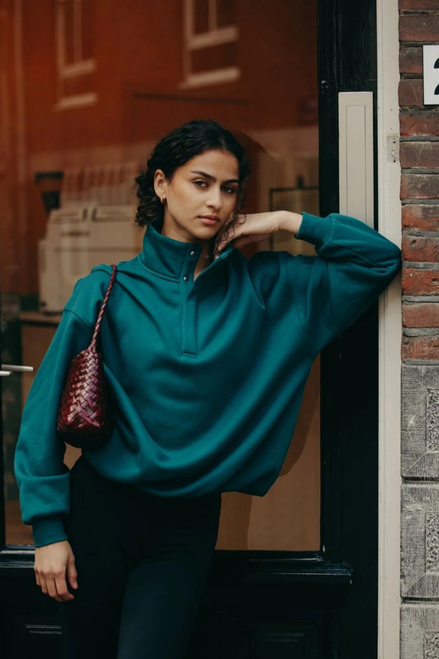 Gym+Coffee turquoise snap-collar Sierra sweatshirt with oversized fit and ribbed detail at Dotique.