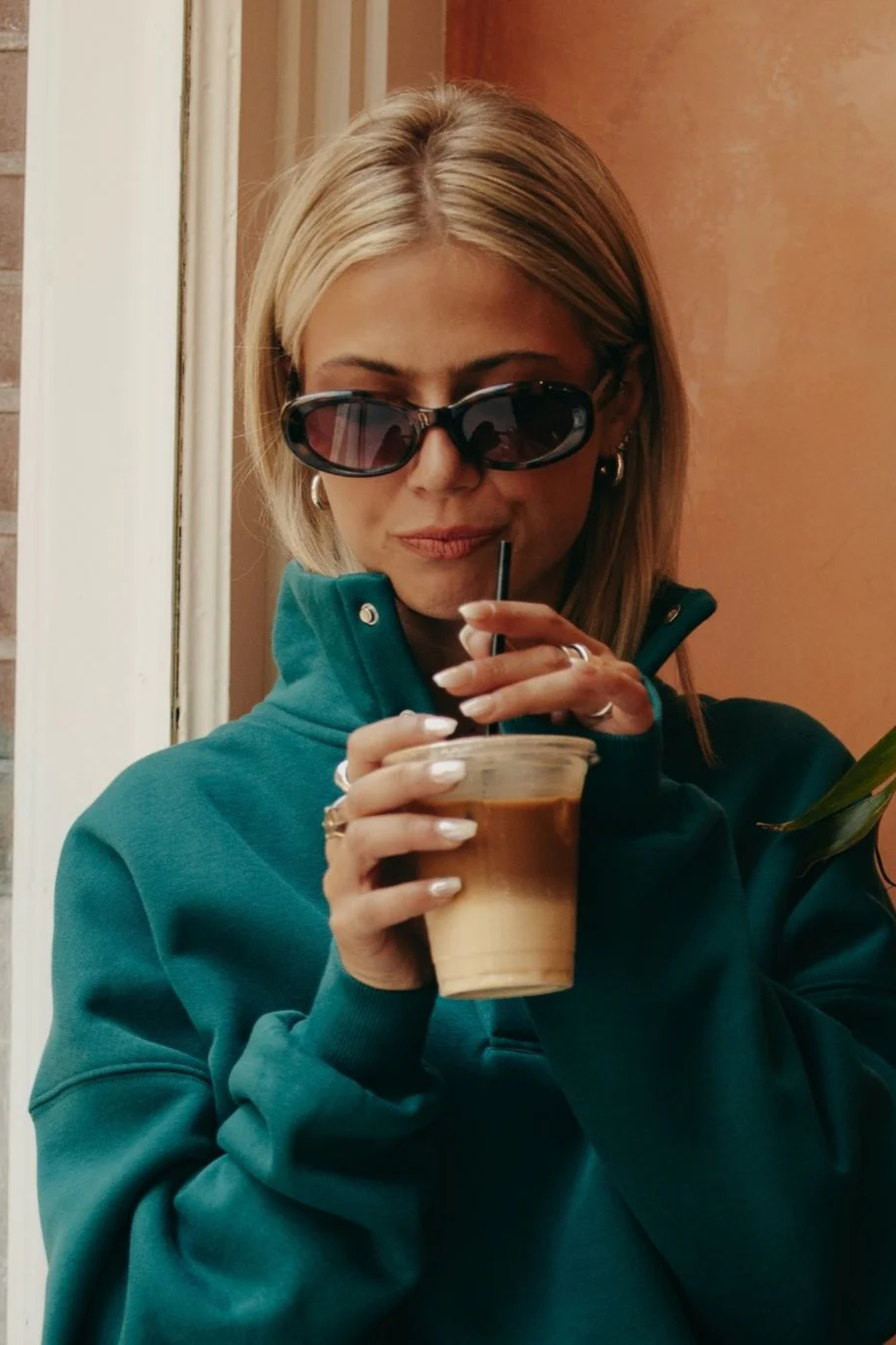 Gym+Coffee turquoise snap-collar Sierra sweatshirt with oversized fit and ribbed detail at Dotique.