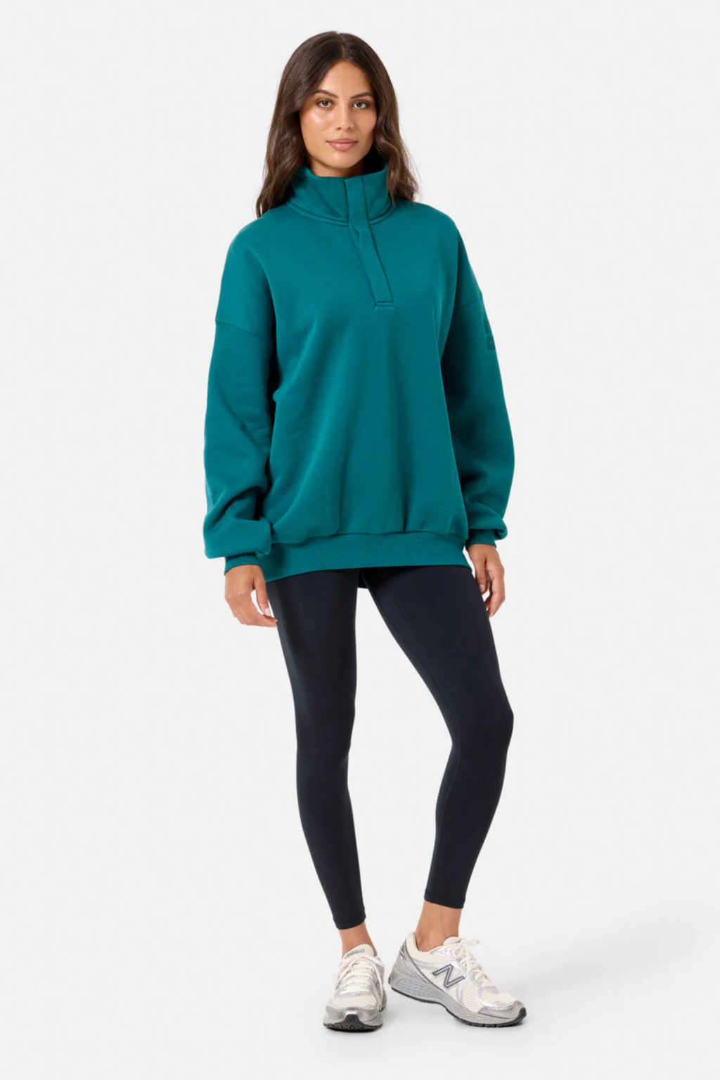Gym+Coffee turquoise snap-collar Sierra sweatshirt with oversized fit and ribbed detail at Dotique.