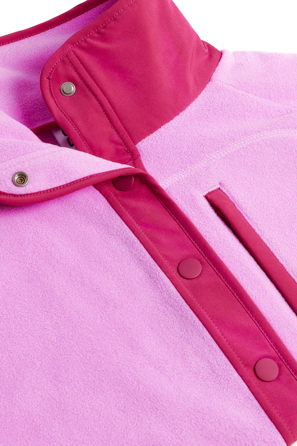 Close-up of Gym+Coffee Snap Polar Fleece Neon Pink with snap buttons and contrast trim by Gym+Coffee Shop Gym+Coffee at Dotique