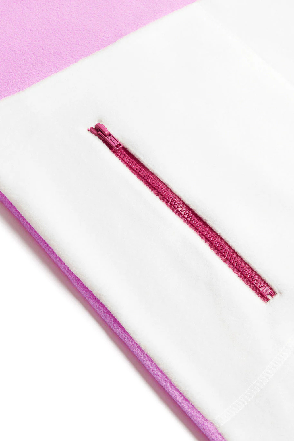 Close-up of zippered pocket on Gym+Coffee Snap Polar Fleece Neon Pink fleece by Gym+Coffee Shop Gym+Coffee at Dotique