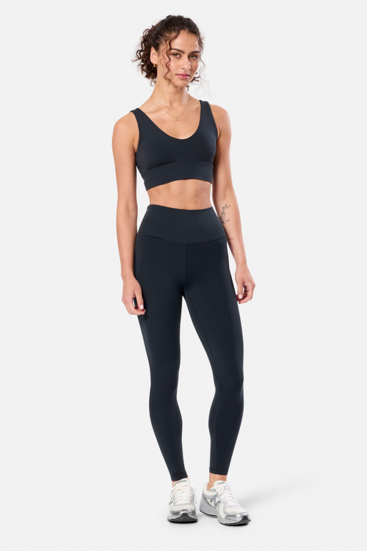 Woman wearing Gym + Coffee Soft-Motion Bra Black by Gym+Coffee, shop Gym+Coffee activewear at Dotique online store.