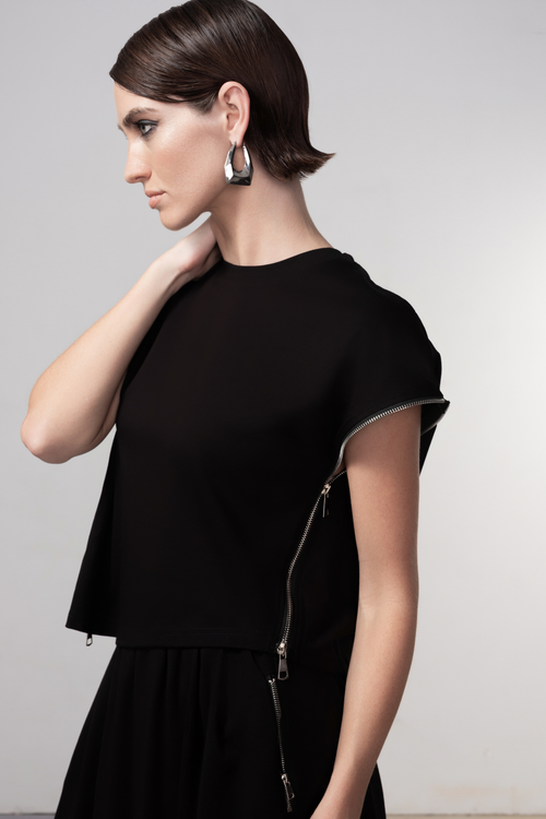Haako black sleeveless top with side zip detail styled in a minimalist look at Dotique