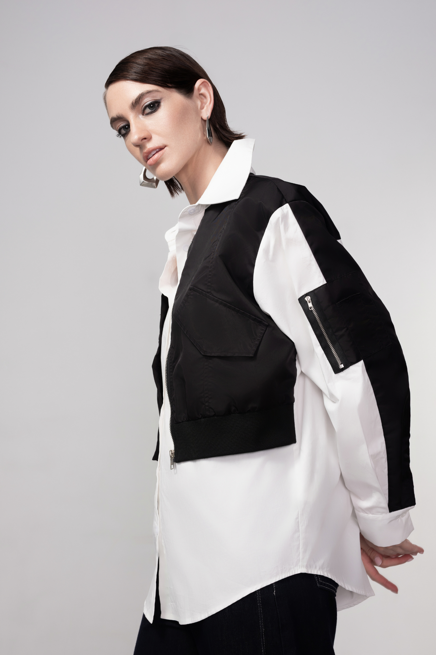 Haako black and white cotton shirt styled in a modern minimalist outfit at Dotique