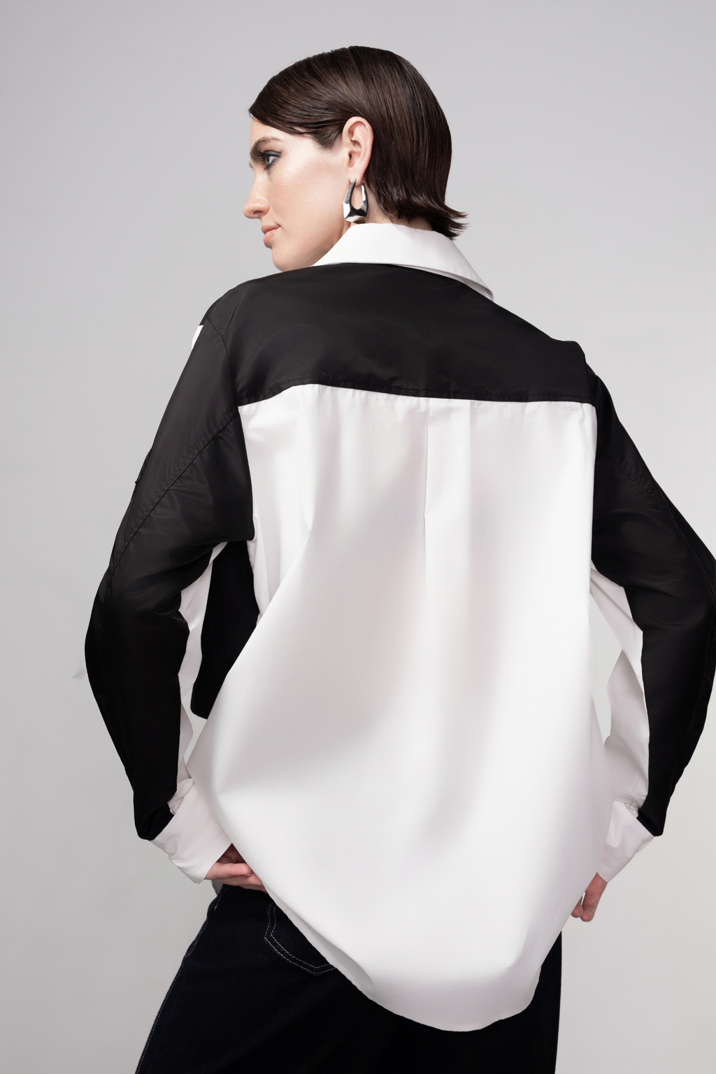 Haako black and white cotton shirt styled in a modern minimalist outfit at Dotique