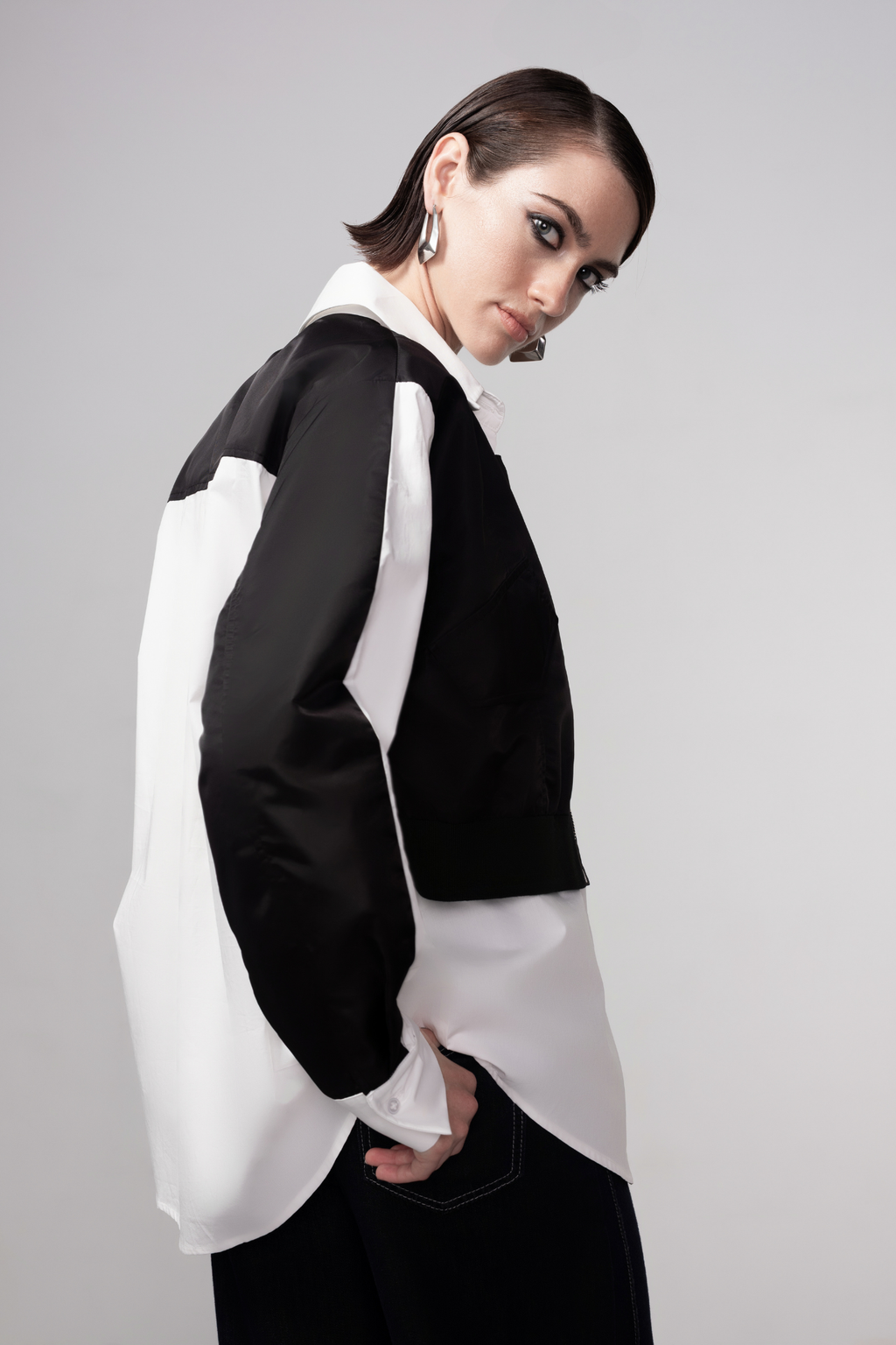 Haako black and white cotton shirt styled in a modern minimalist outfit at Dotique