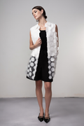 Haako white sheer long vest with circle detail styled in a minimalist layered look at Dotique
