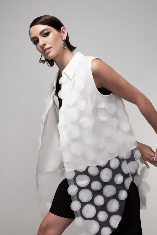 Haako white sheer long vest with circle detail styled in a minimalist layered look at Dotique