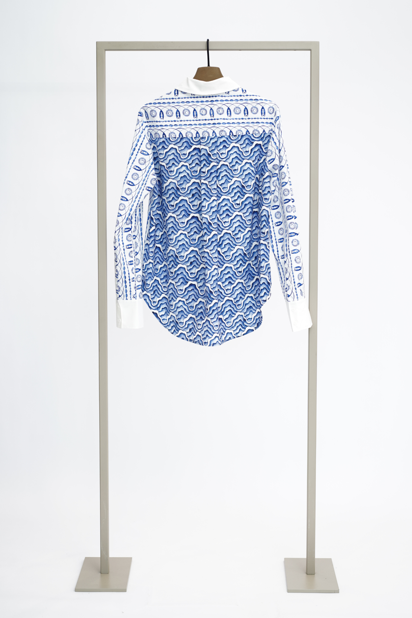 Herzen's Angelegenheit 6210 Silk Blouse Azure hanging on a rack, shop Herzen's Angelegenheit at Dotique.