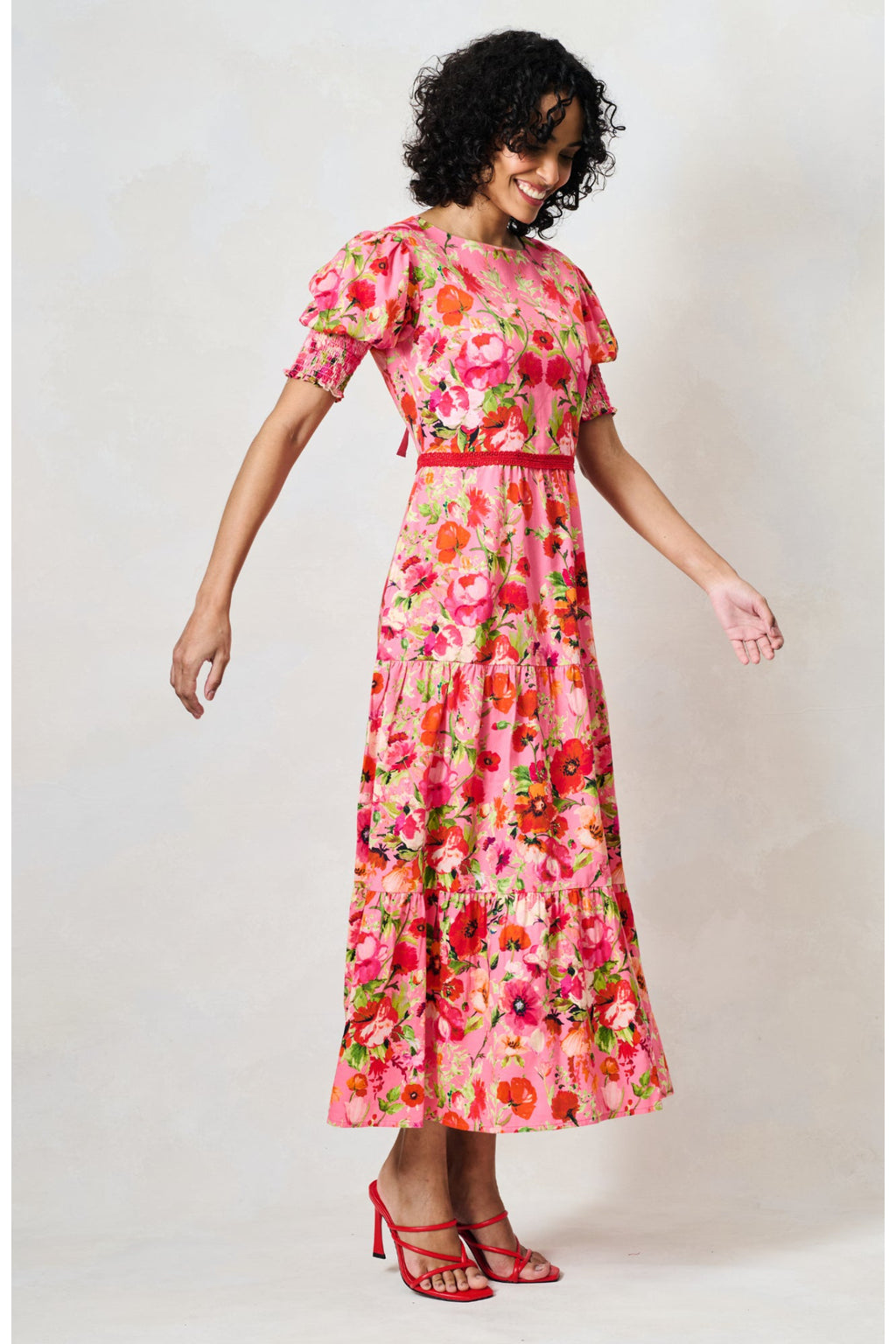 Model wearing Hope & Ivy The Amara Puff Sleeve Bow Back Maxi Dress Pink & Red Floral by Hope and Ivy Shop at Dotique