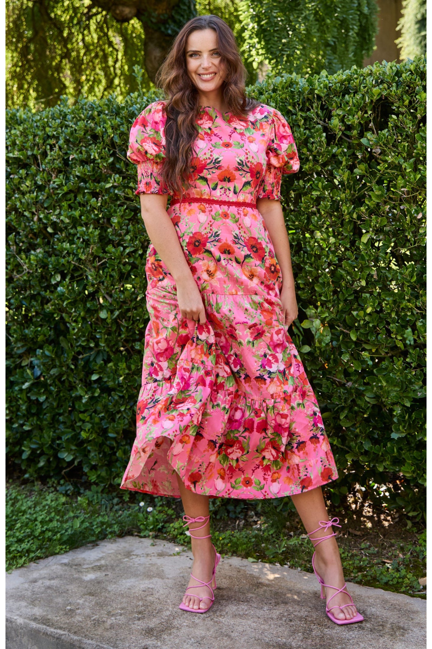 Woman wearing Hope & Ivy The Amara Puff Sleeve Bow Back Maxi Dress Pink & Red Floral by Hope and Ivy, shop at Dotique