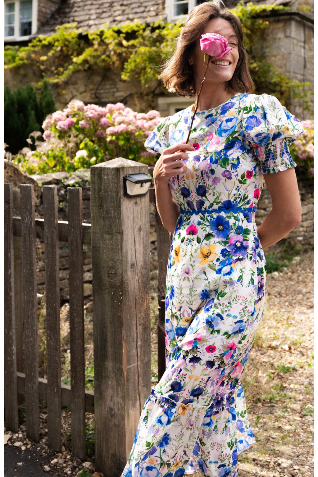 Hope & Ivy Charlotte Ann Puff Sleeve Maxi Dress Blue Floral by Hope and Ivy, shop the vendor at Dotique outdoors smiling woman