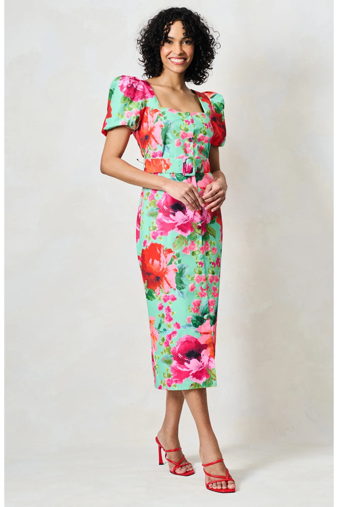 Woman wearing Hope & Ivy The Rowena Puff Sleeve Sweetheart Neckline Pencil Dress by Hope and Ivy shopable at Dotique.