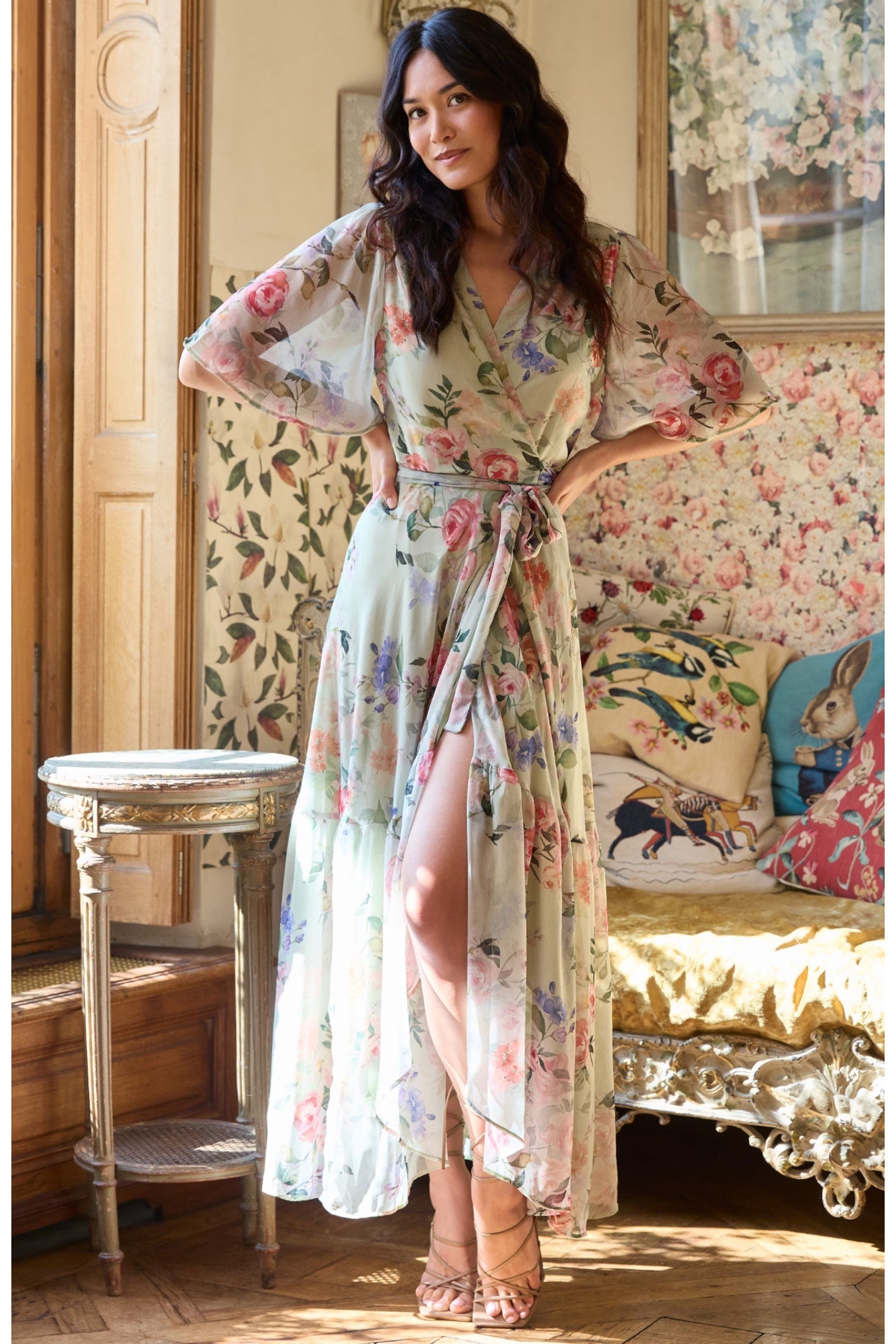 Hope & Ivy The Emi Flutter Sleeve Floral Wrap Maxi Dress Green worn by model, shop Hope and Ivy at Dotique elegant setting.