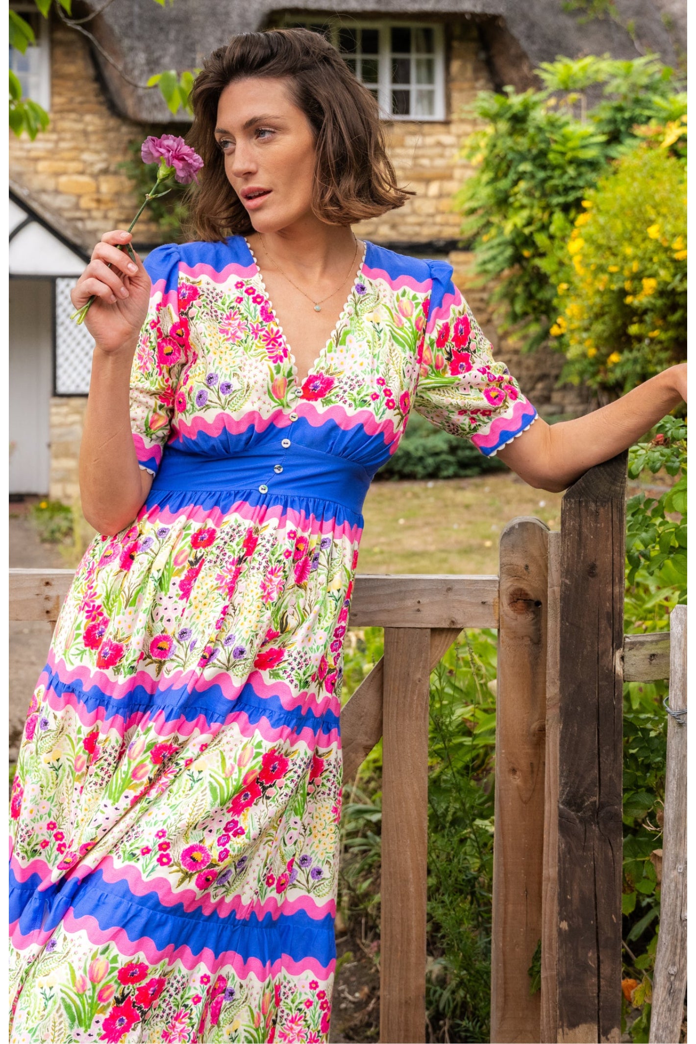 Woman wearing Hope & Ivy The Jo Blue & Pink Floral Tea Dress by Hope and Ivy, shop Hope and Ivy at Dotique.