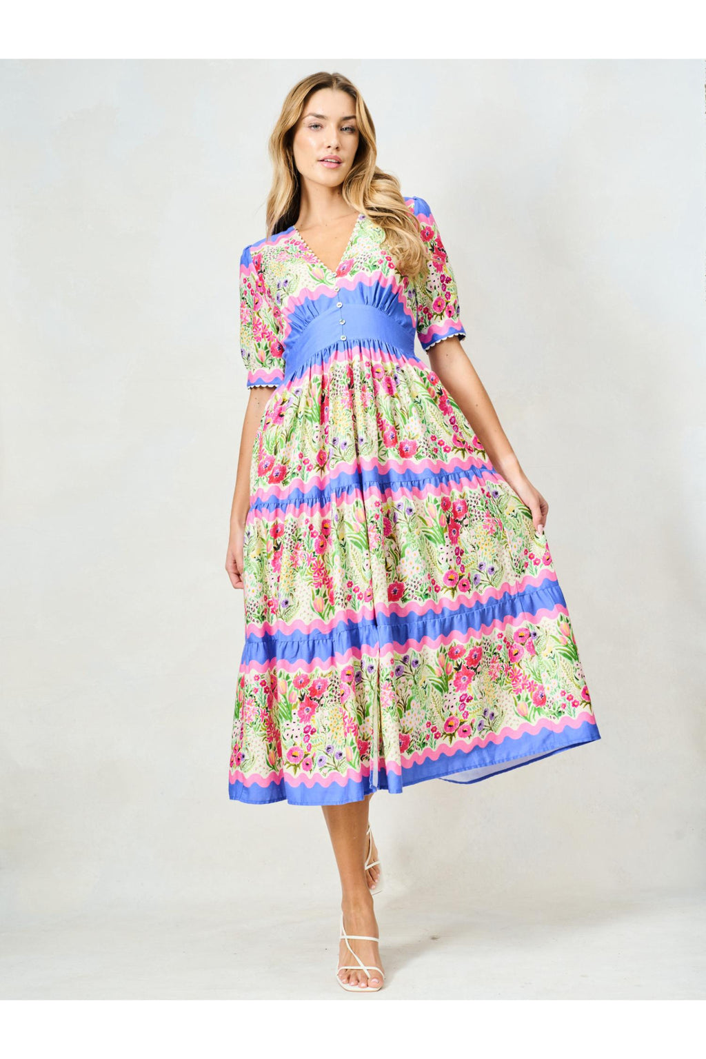 Woman wearing Hope & Ivy The Jo Blue & Pink Floral Tea Dress by Hope and Ivy, shop the vendor at Dotique.