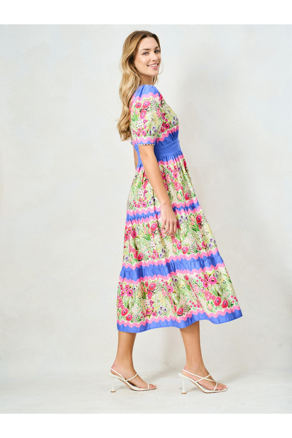 Woman wearing Hope & Ivy The Jo Blue & Pink Floral Tea Dress by Hope and Ivy, shop the vendor at Dotique.