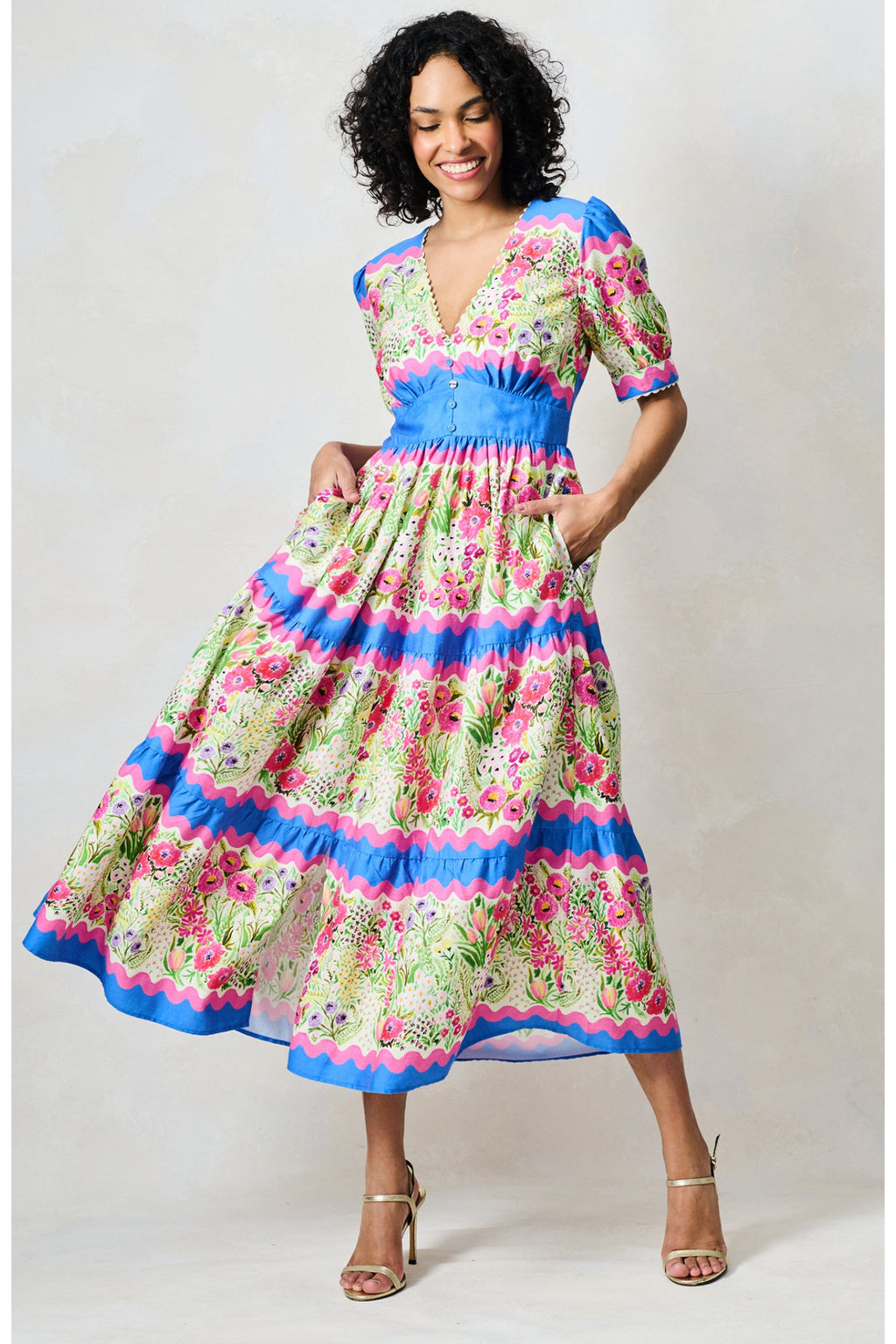 Woman wearing Hope & Ivy The Jo Blue & Pink Floral Tea Dress by Hope and Ivy, shop Hope and Ivy at Dotique.