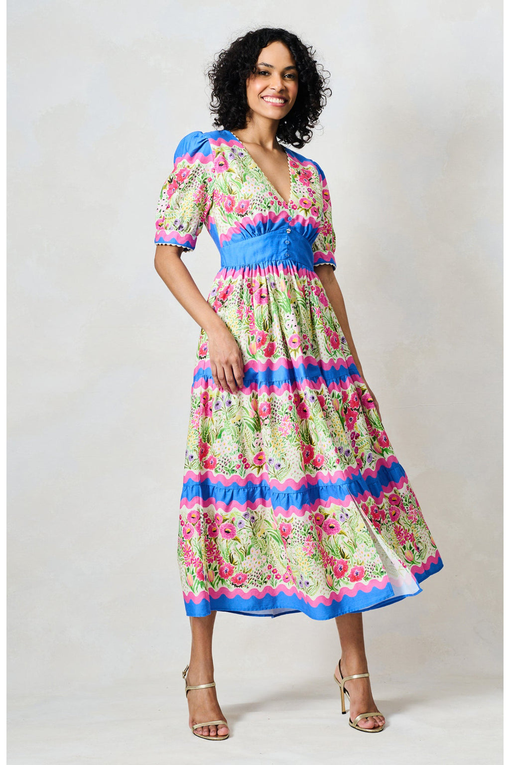 Woman wearing Hope & Ivy The Jo Blue & Pink Floral Tea Dress by Hope and Ivy, shop the vendor at Dotique.