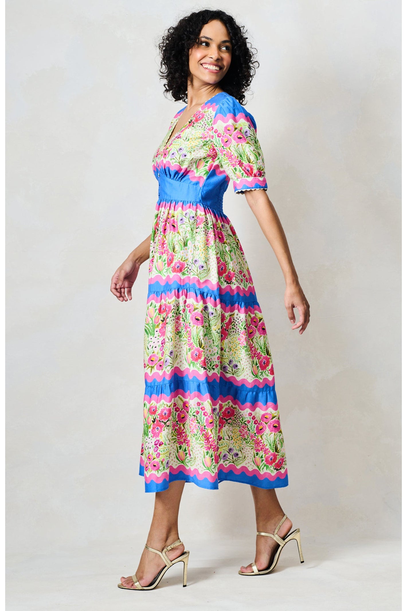 Woman wearing Hope & Ivy The Jo Blue & Pink Floral Tea Dress by Hope and Ivy, shop Hope and Ivy at Dotique.