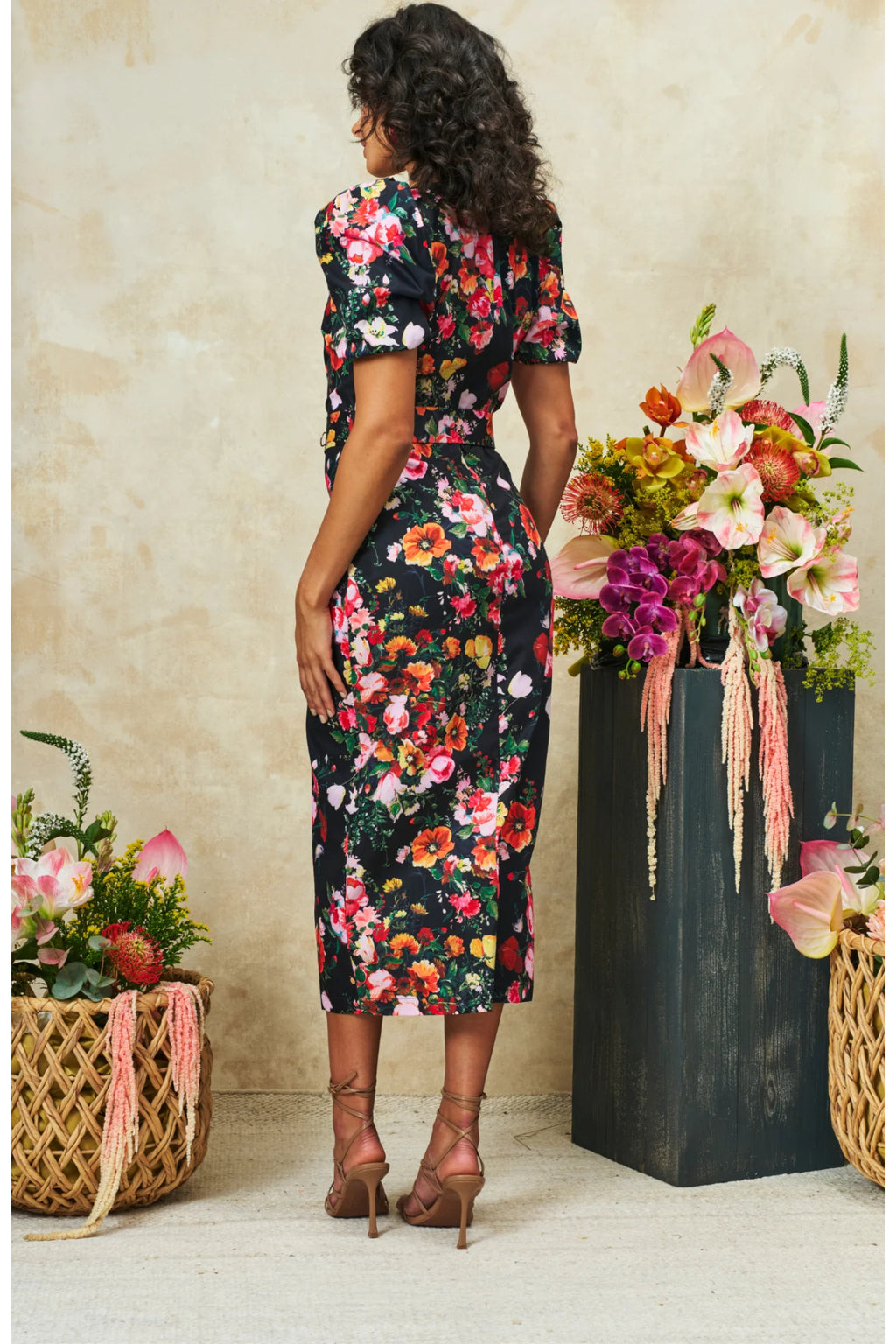 Woman wearing Hope & Ivy The Trisha Puff Sleeve Square Neck Midi Pencil Dress with floral print, shop Hope and Ivy at Dotique.