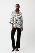 Joseph Ribkoff vanilla and black abstract seersucker trapeze jacket with contrast buttons at Dotique