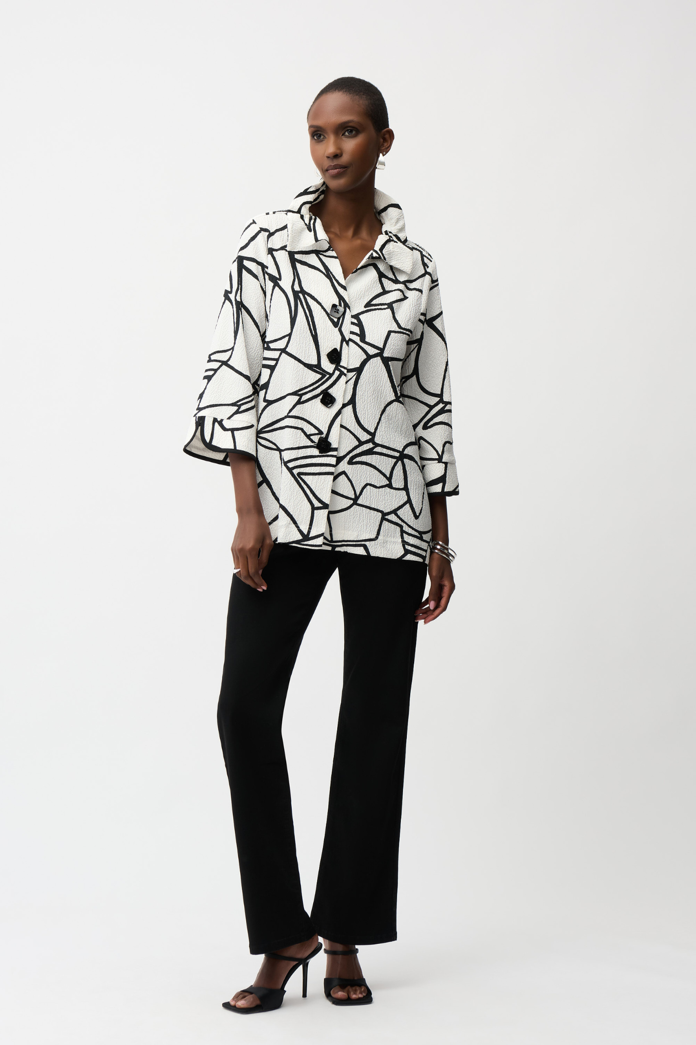 Joseph Ribkoff vanilla and black abstract seersucker trapeze jacket with contrast buttons at Dotique