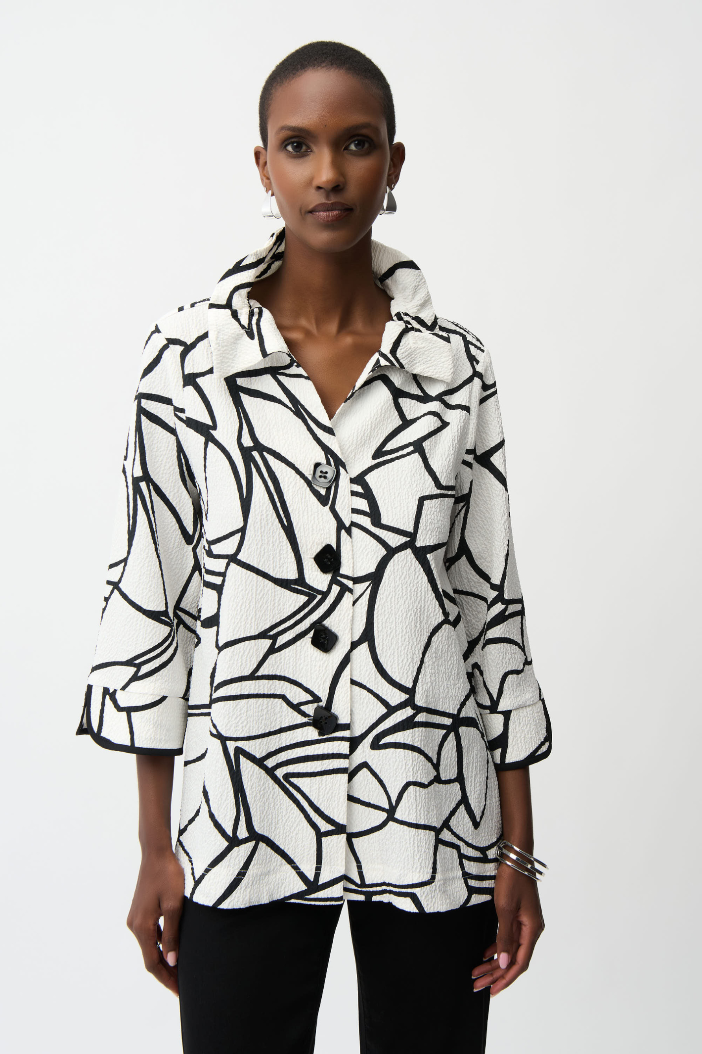 Joseph Ribkoff vanilla and black abstract seersucker trapeze jacket with contrast buttons at Dotique
