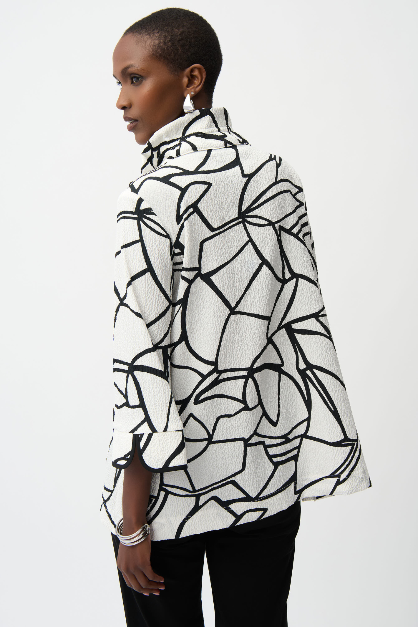 Joseph Ribkoff vanilla and black abstract seersucker trapeze jacket with contrast buttons at Dotique