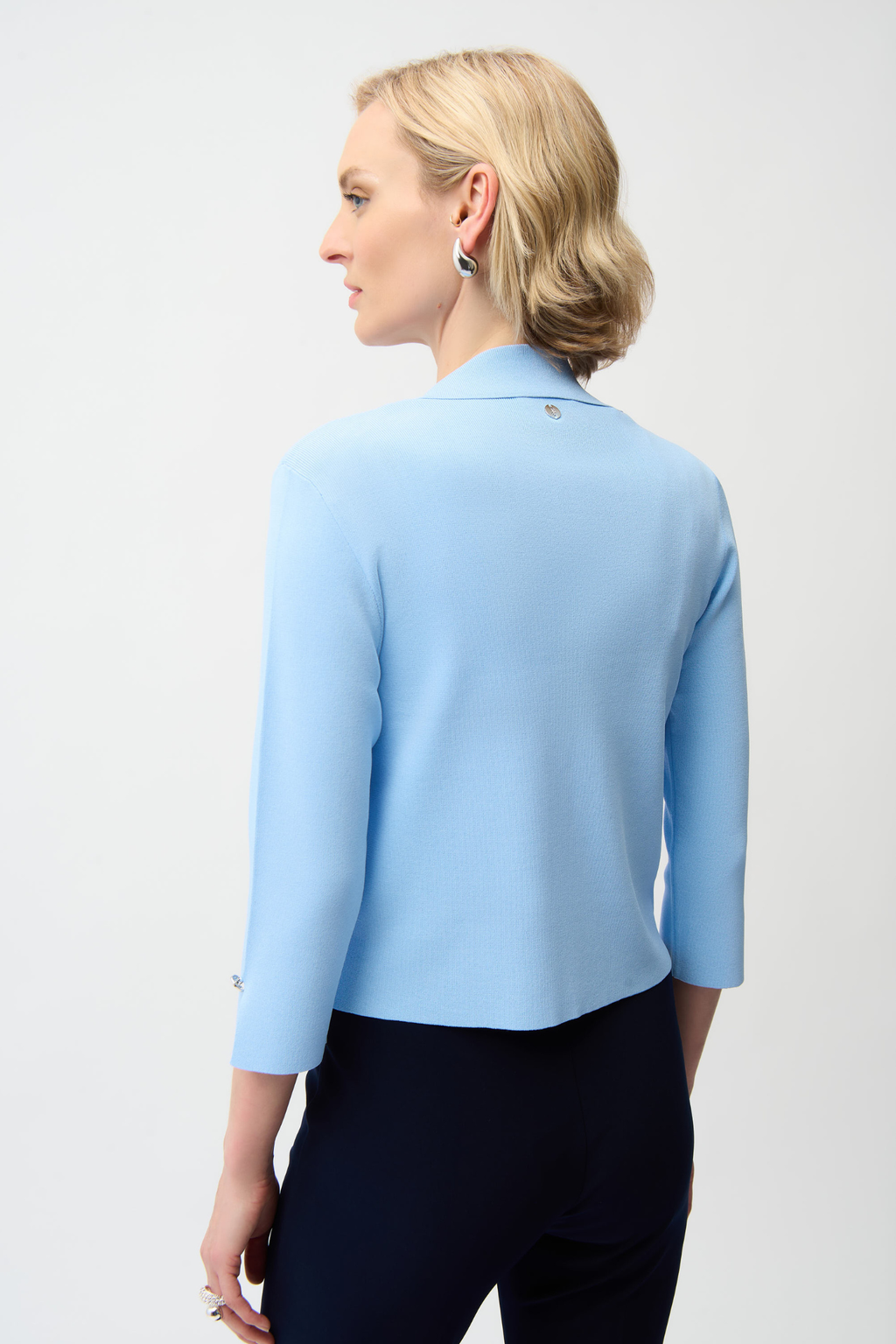 Women’s lightweight sky blue cardigan with slit sleeves and button detail by Joseph Ribkoff.