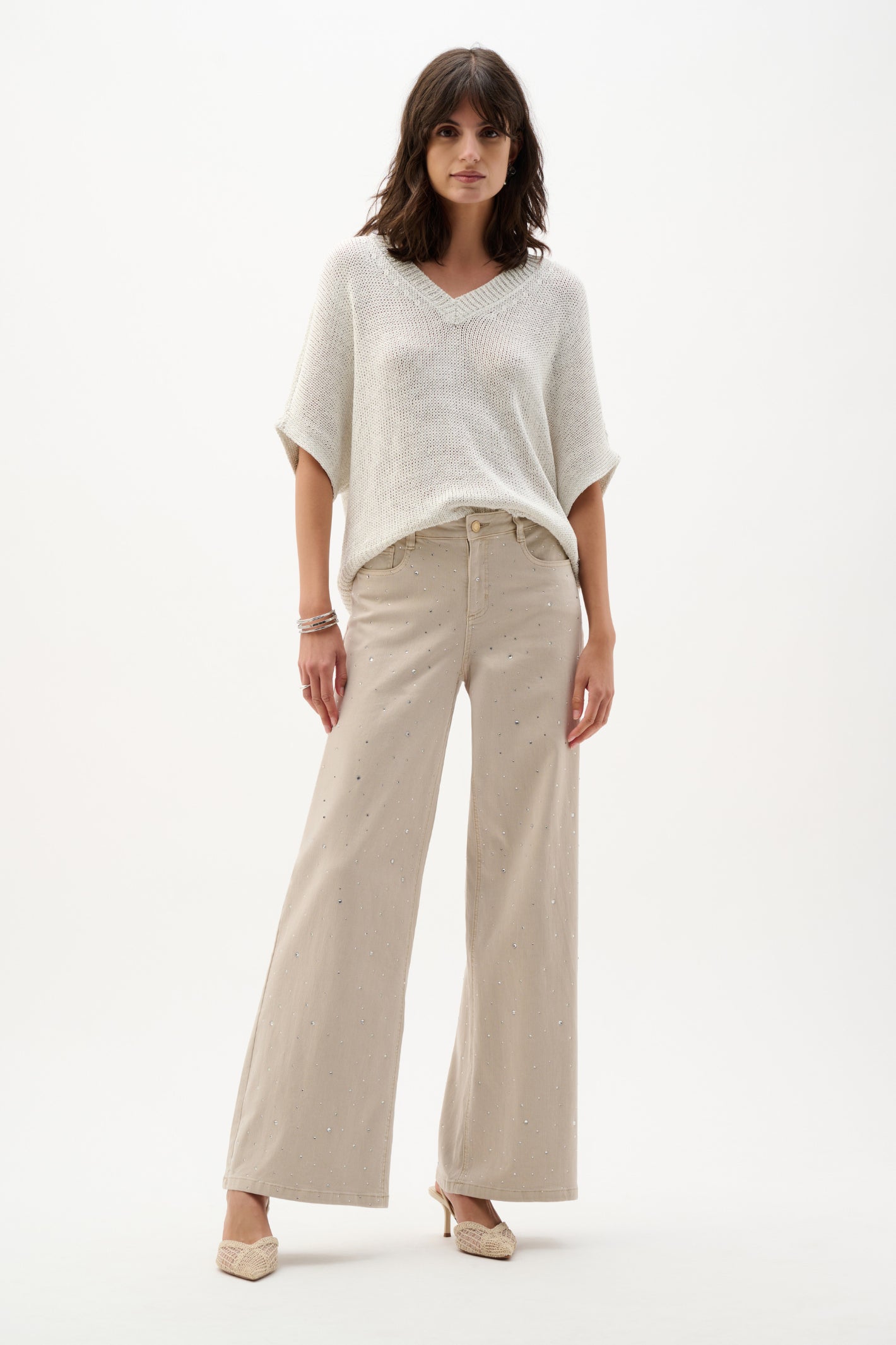 Woman wearing Joseph Ribkoff 262940 Moonstone Featherweave™ Denim Wide Leg Jeans With Rhinestones by Joseph Ribkoff, shop Dotique.