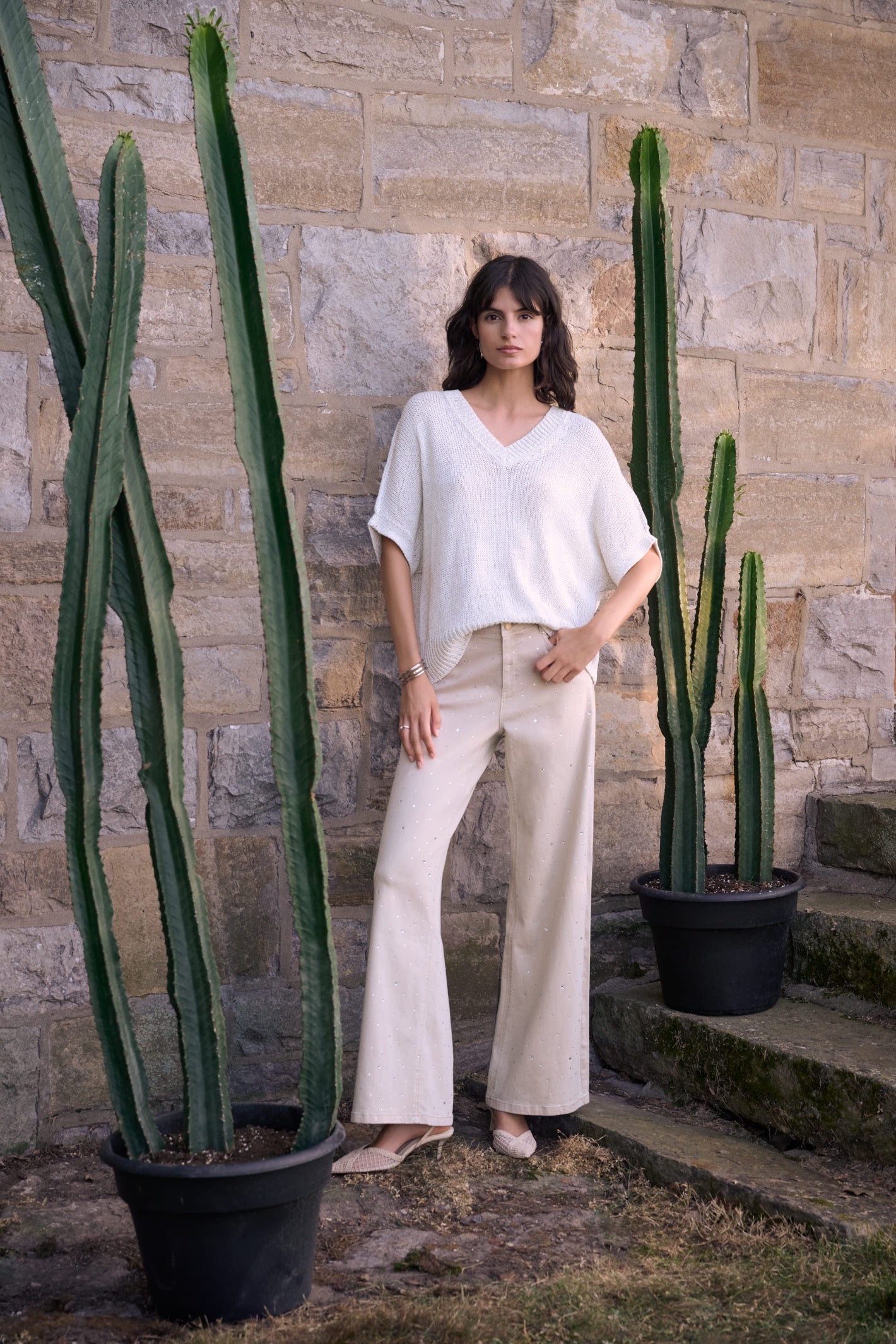 Woman wearing Joseph Ribkoff 262940 Moonstone Featherweave™ Denim Wide Leg Jeans With Rhinestones by Joseph Ribkoff shop Dotique