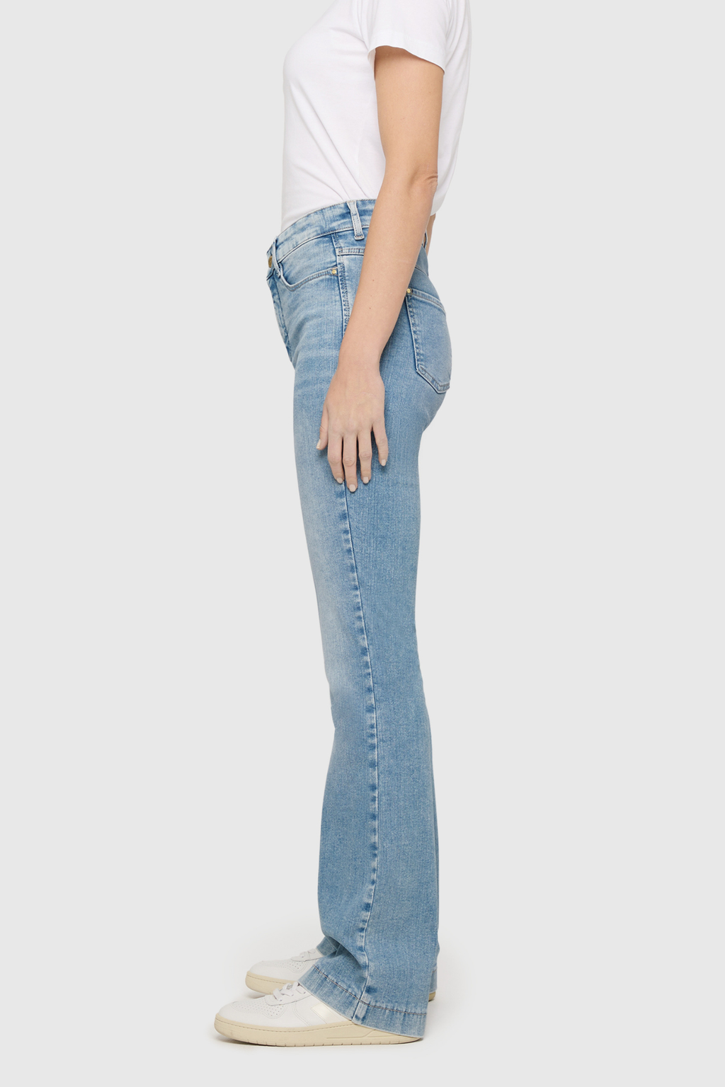 Side view of model wearing MAC Jeans DREAM BOOT Authentic Mega Flex Summer Blue Clouds Wash Bootcut Jeans 5439-90-0358L-D215 by Mac Jeans shop at Dotique