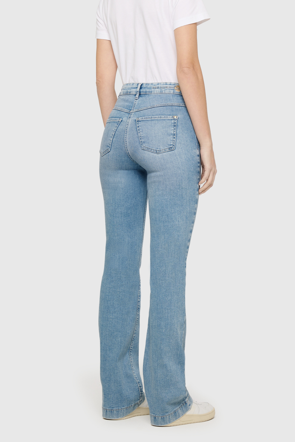 Model wearing MAC Jeans DREAM BOOT Authentic Mega Flex Summer Blue Clouds Wash Bootcut Jeans 5439-90-0358L-D215 by Mac Jeans Shop Mac Jeans at Dotique