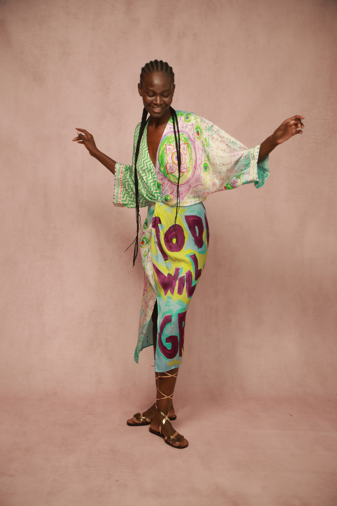 Model wearing Me369 Camila Runic Whisper Dress by Me369 with vibrant designs, shop Me369 at Dotique for unique style