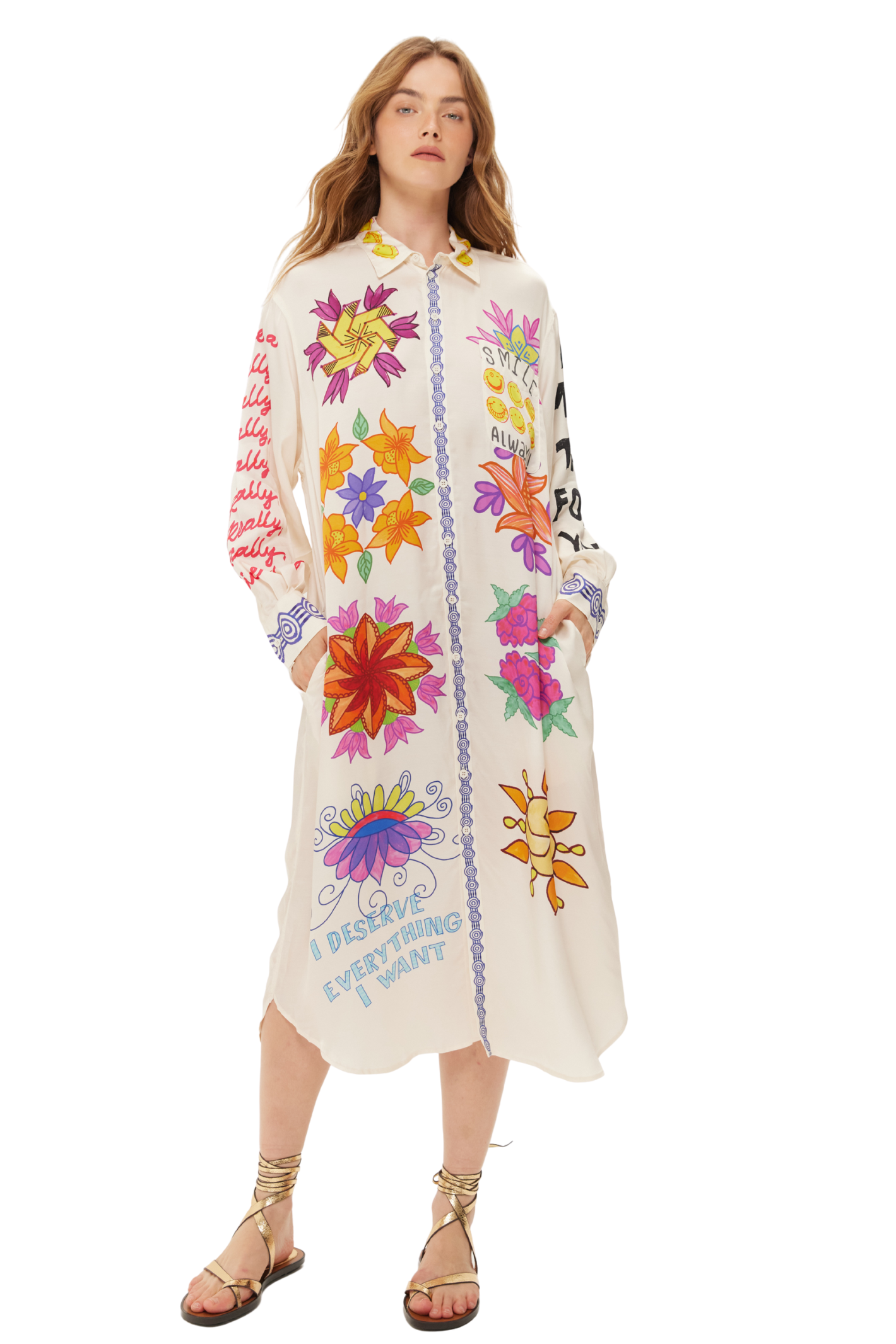 Model wearing Me369 Vivi Markers Dress by Me369 with colorful florals and text, shop Me369 at Dotique