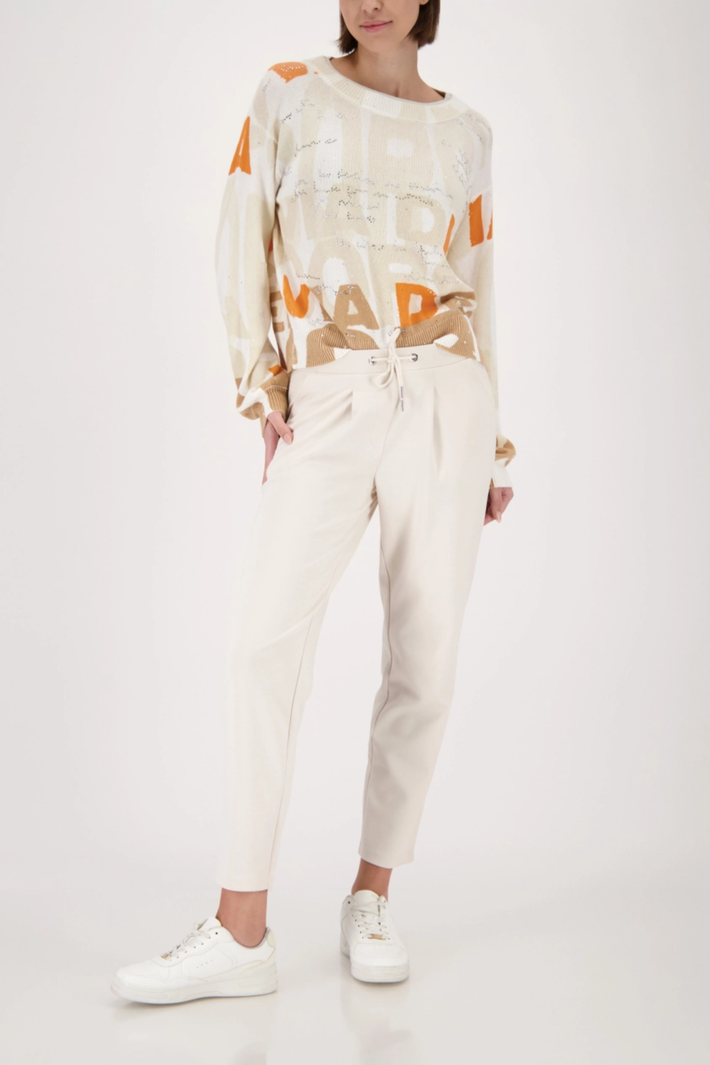 Model wearing Monari 410465 Drawstring Sweatpants Champagne Beige by Monari, shop Monari at Dotique.