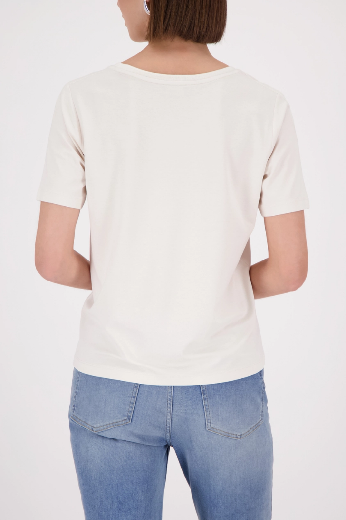 Back view of a woman wearing Monari 410467 Rhinestone Detail Top Champagne Beige by Monari, shop the vendor at Dotique.